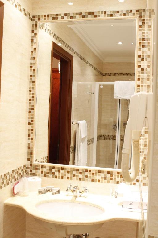 Koupelna v ubytování Hotel Genio