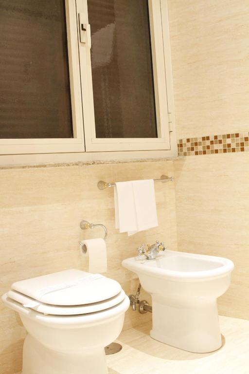 Koupelna v ubytování Hotel Genio