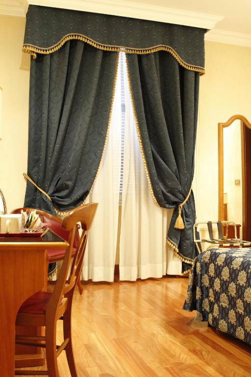 Posezení v ubytování Hotel Genio