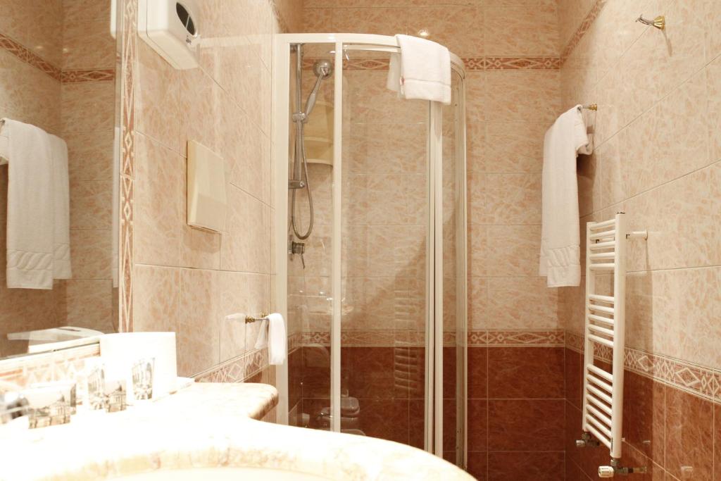 Koupelna v ubytování Hotel Genio