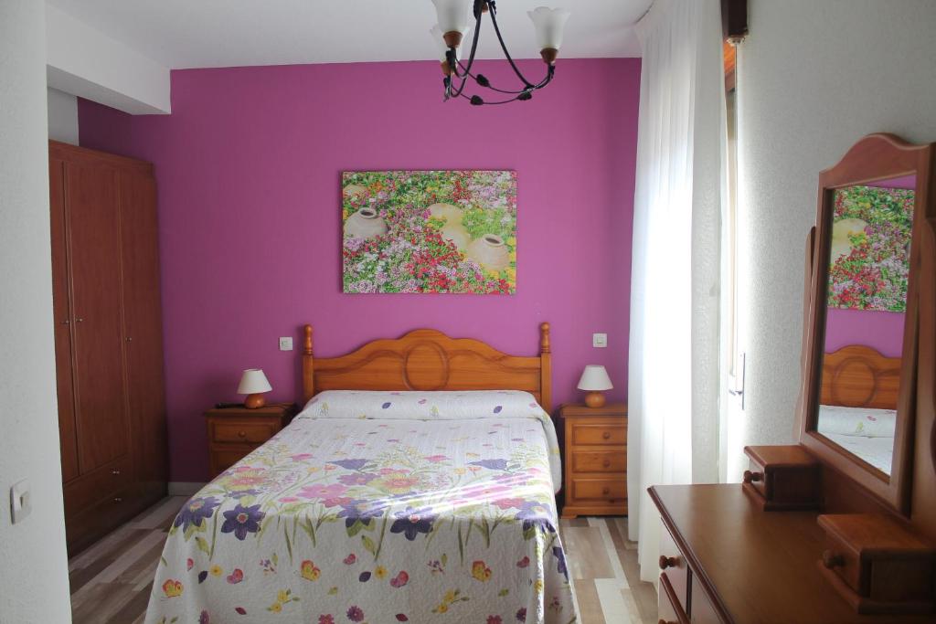 Postel nebo postele na pokoji v ubytování La Flor de Quejo