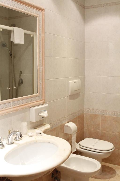 Koupelna v ubytování Hotel Pace Helvezia