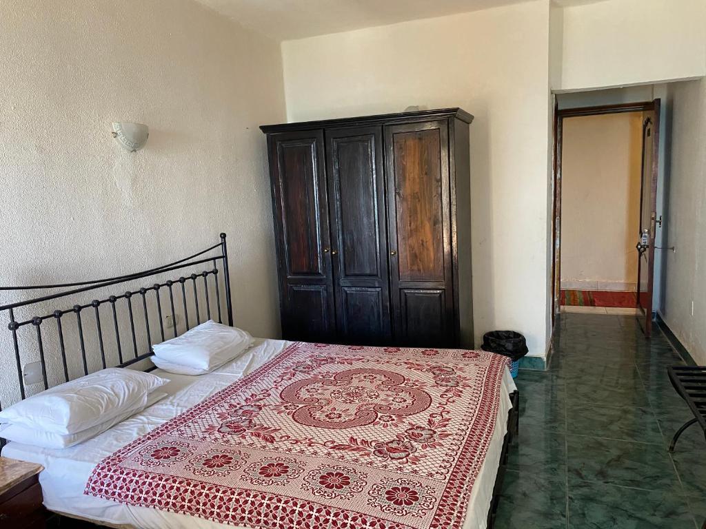 Postel nebo postele na pokoji v ubytování Semiramis Hotel Royal Palace