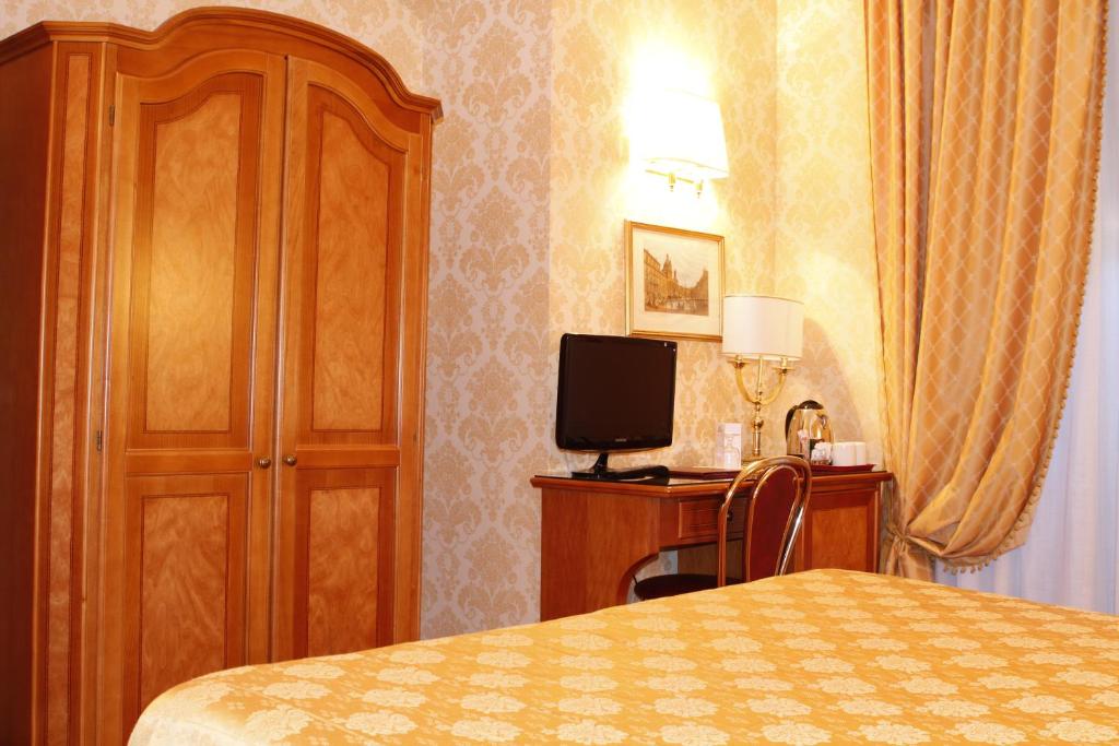 TV a/nebo společenská místnost v ubytování Hotel Pace Helvezia