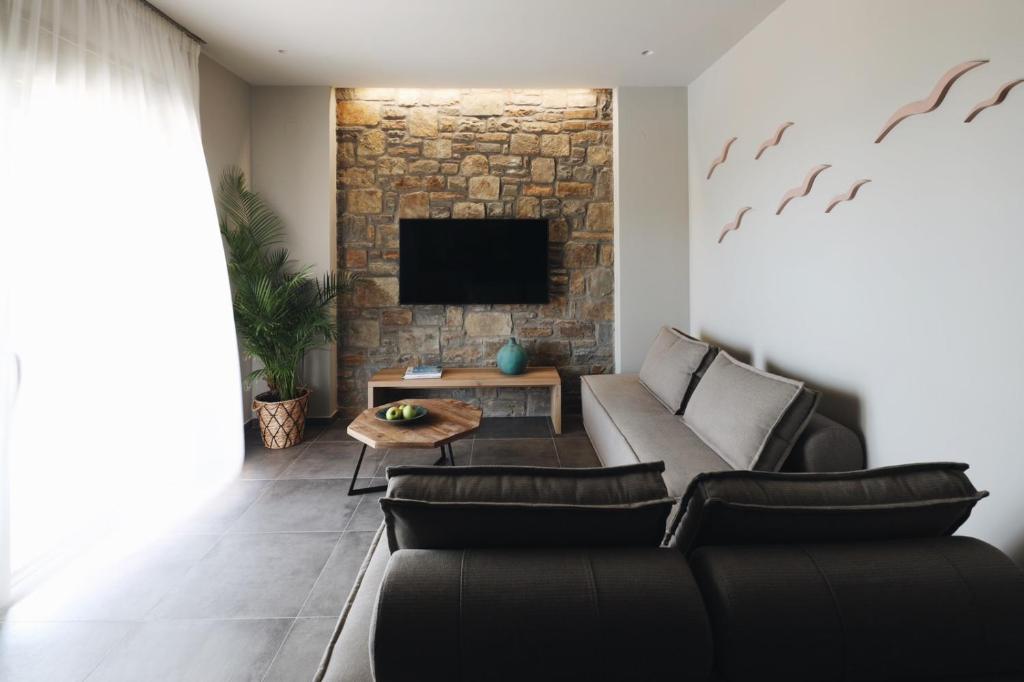 A television and/or entertainment centre at Costa D' Ifesto