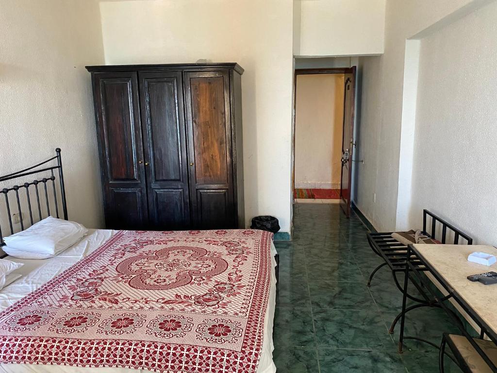 Postel nebo postele na pokoji v ubytování Semiramis Hotel Royal Palace