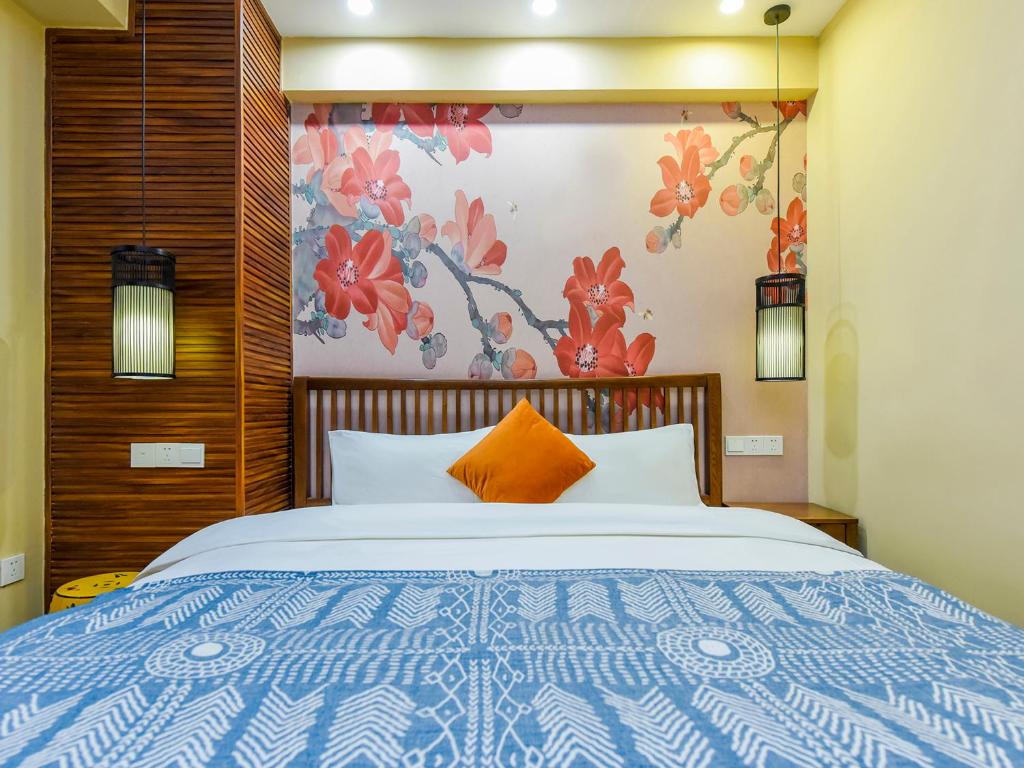 Postel nebo postele na pokoji v ubytování Chongqing Ouranjian Lake View Guesthouse