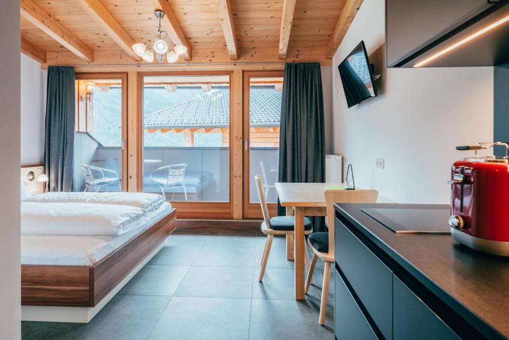 Postel nebo postele na pokoji v ubytování Tillga Glück - 4 stars