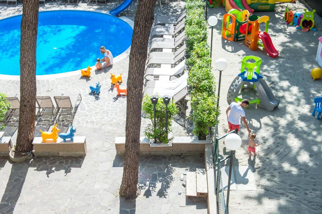 an overhead view of a playground with a swimming pool at Meridiana Family & Nature Hotel in Marina Romea