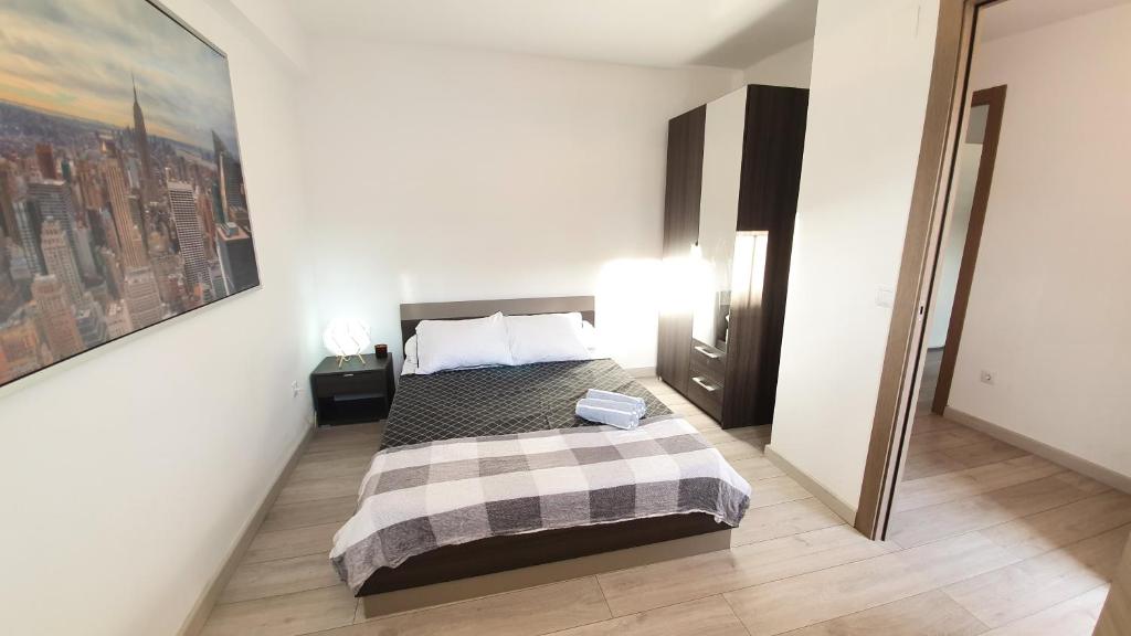 Posteľ alebo postele v izbe v ubytovaní ADAM's FLAT CORAZON DE SALOU