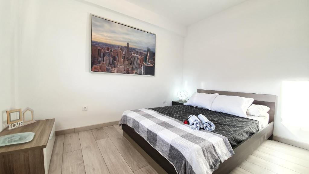 Posteľ alebo postele v izbe v ubytovaní ADAM's FLAT CORAZON DE SALOU