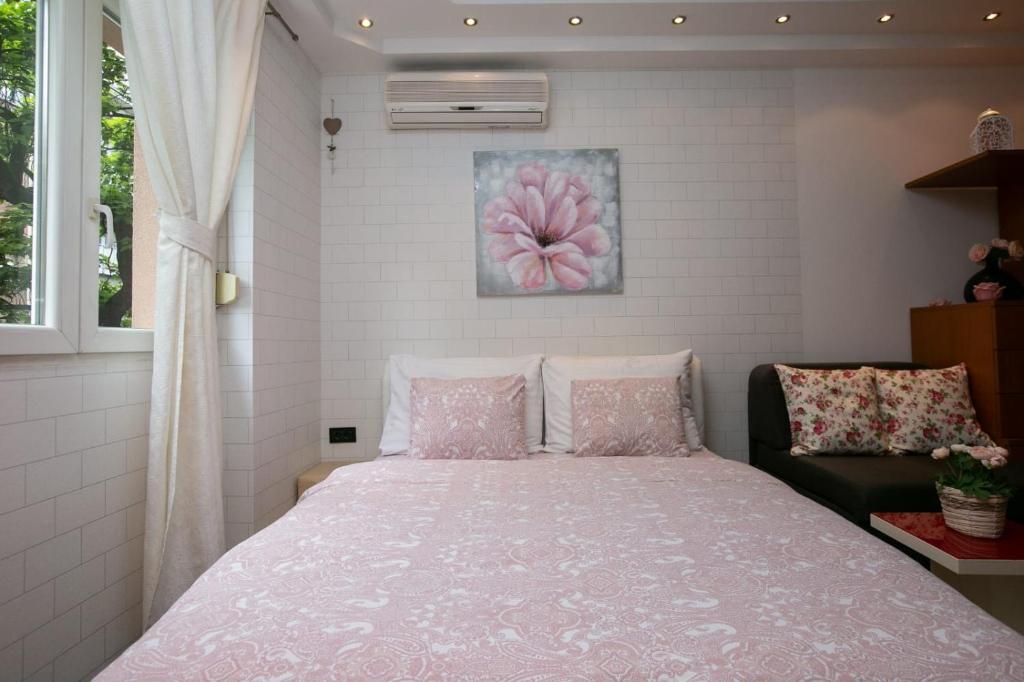 Postel nebo postele na pokoji v ubytování Studio Ami