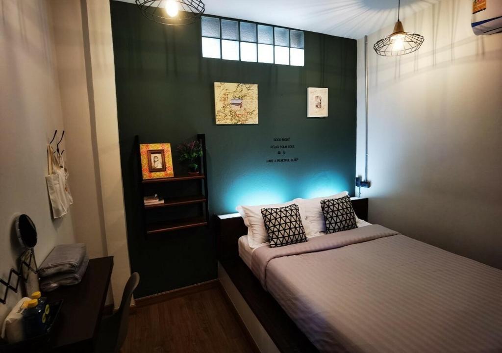 Postel nebo postele na pokoji v ubytování Chernchan Hostel