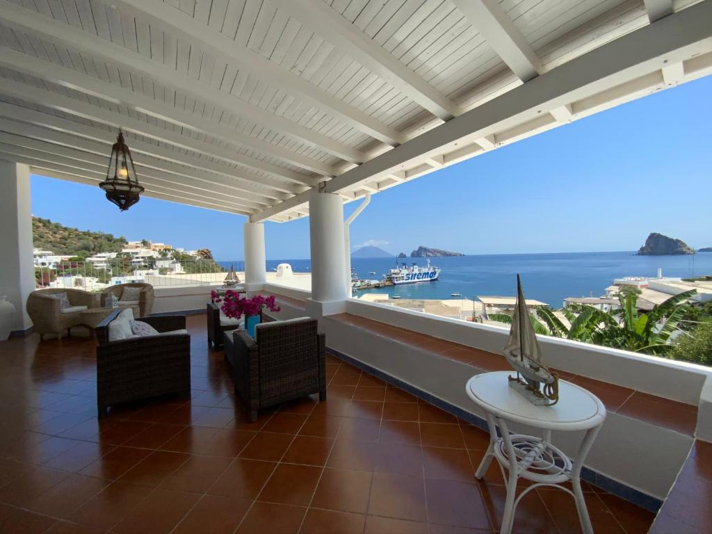 a living room with a view of the ocean at Basiluzzo Resort in Panarea