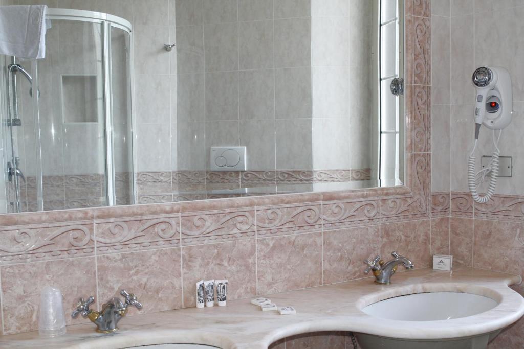 Koupelna v ubytování Hotel Eliseo