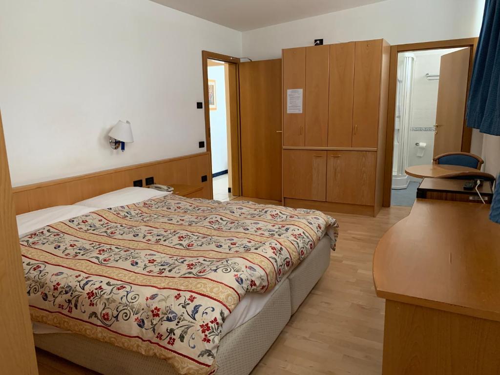 Postel nebo postele na pokoji v ubytování Garni Enrosadira