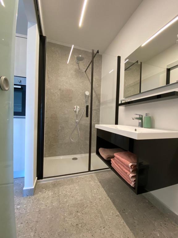 Kúpeľňa v ubytovaní Apartmani Kumenat