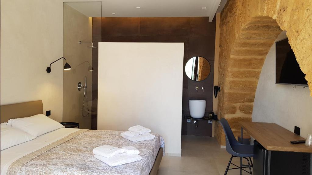 Postel nebo postele na pokoji v ubytování Villa Lekythos