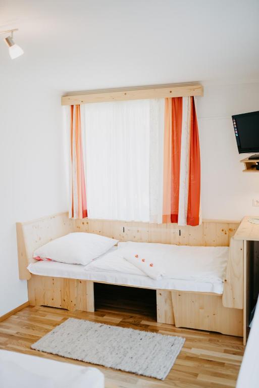 Postel nebo postele na pokoji v ubytování Appartement VIDMAR-FERIENGLÜCK