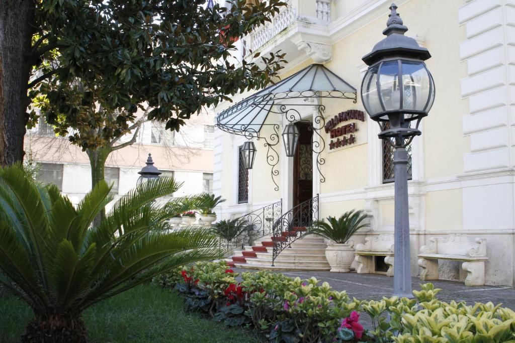 a street light in front of a building at Hotel Villa Pinciana in Rome