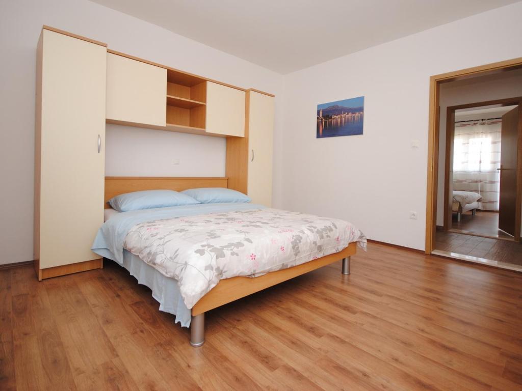 Postel nebo postele na pokoji v ubytování Spacious apartment Antea