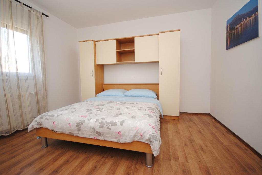 Postel nebo postele na pokoji v ubytování Spacious apartment Antea