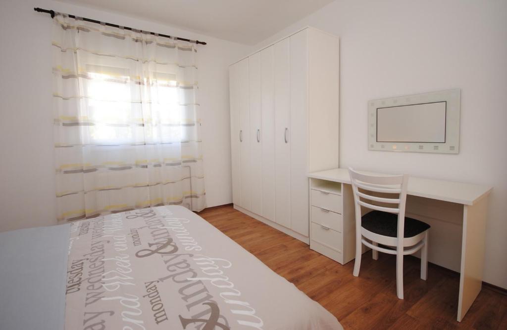 Postel nebo postele na pokoji v ubytování Spacious apartment Antea