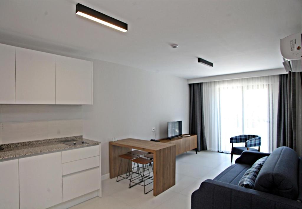 Kuchyň nebo kuchyňský kout v ubytování Queen Residences & Apart Hotel