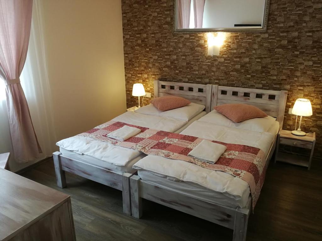 Postel nebo postele na pokoji v ubytování Penzion Starovice