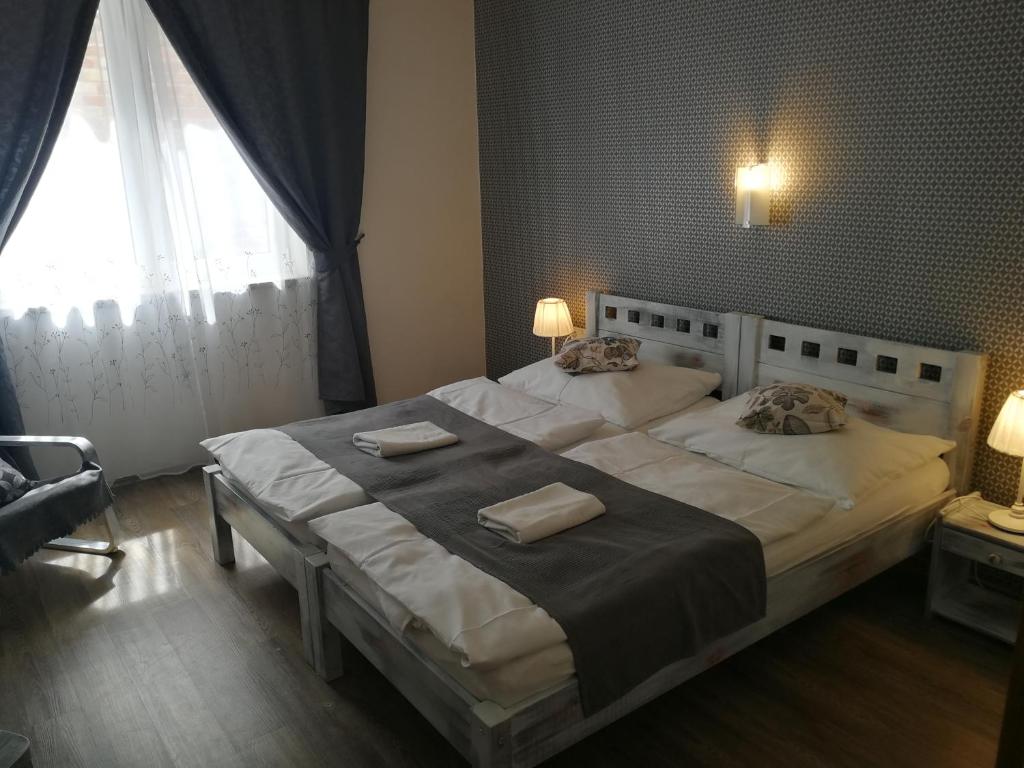 Postel nebo postele na pokoji v ubytování Penzion Starovice