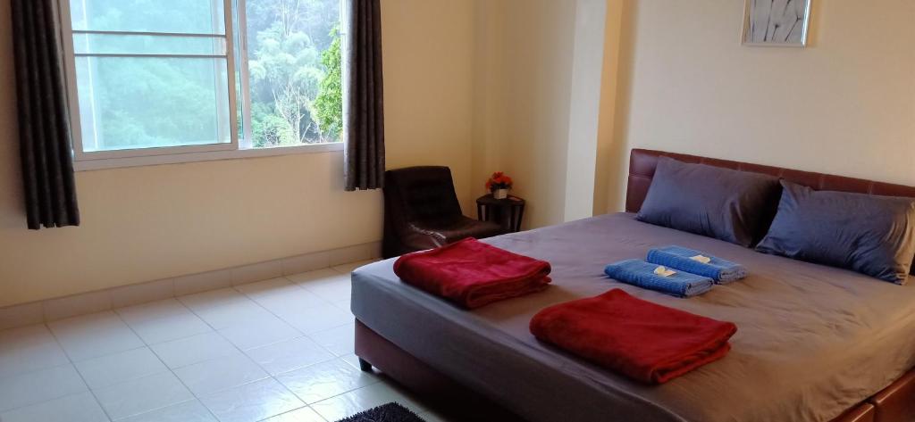Postel nebo postele na pokoji v ubytování DoiTung Homestay ดอยตุงโฮมสเตย์