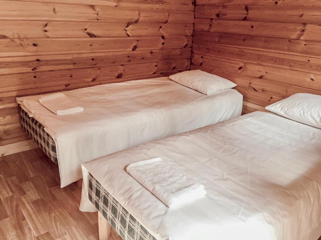 Postel nebo postele na pokoji v ubytování Pruuli Puhkeküla