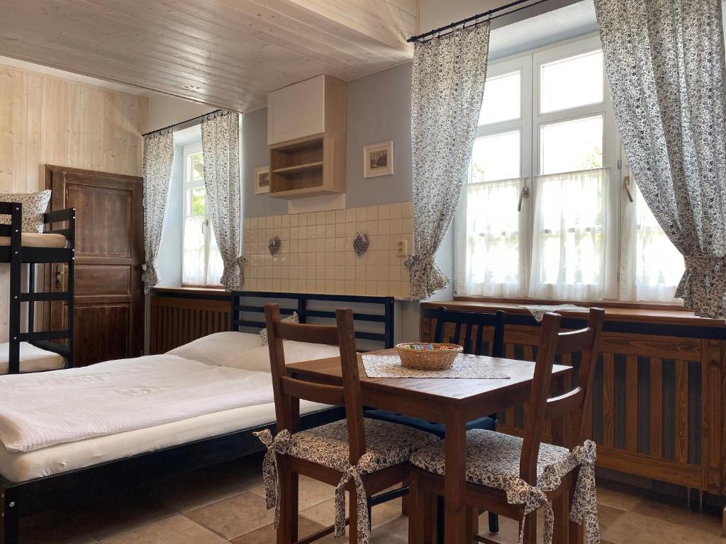 Postel nebo postele na pokoji v ubytování Pension Amadeus & Apartments