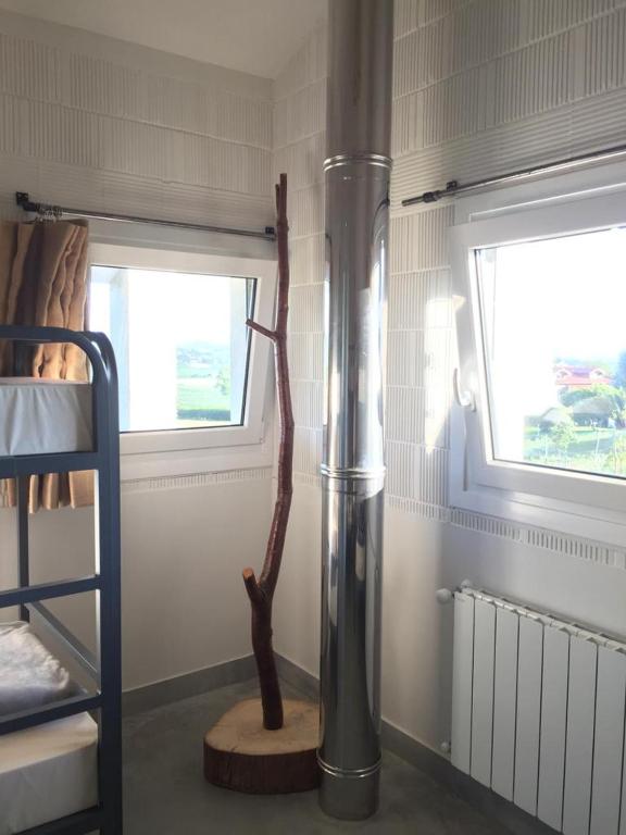 Postel nebo postele na pokoji v ubytování Langre Wayve House