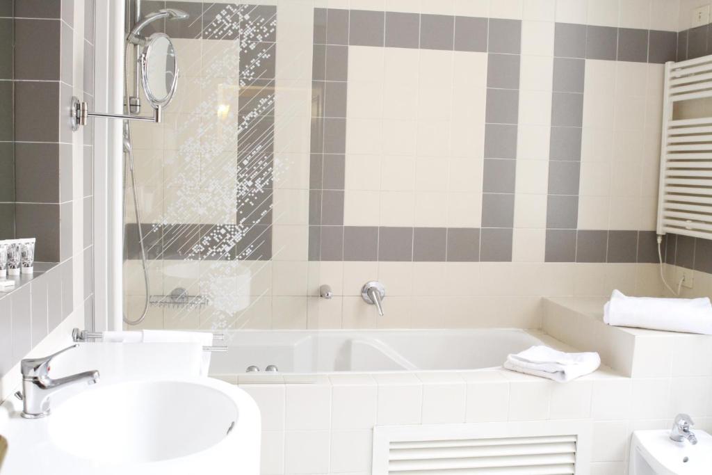 Koupelna v ubytování Hotel Torino