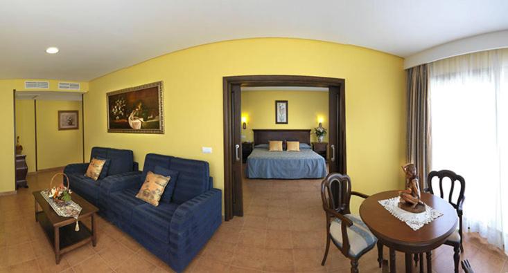 Postel nebo postele na pokoji v ubytování Hotel Porfirio