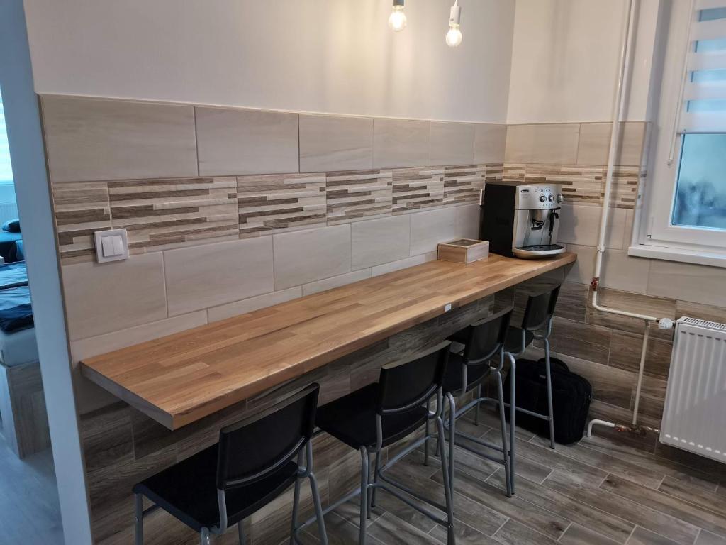 Kuchyň nebo kuchyňský kout v ubytování Sweet Life Apartman