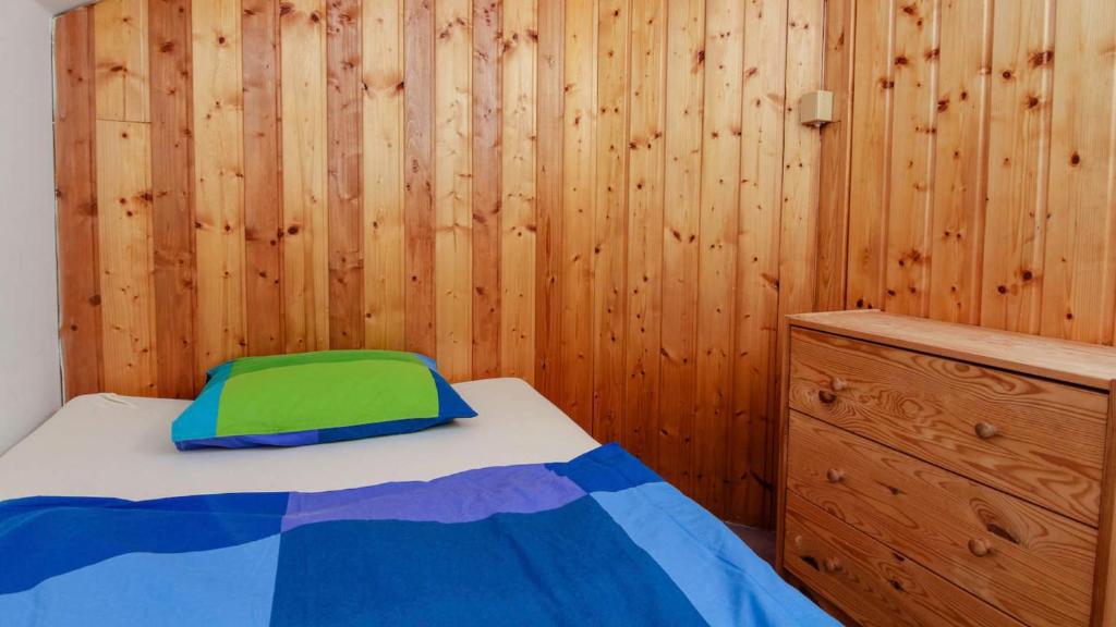Łóżko lub łóżka w pokoju w obiekcie APARTMÁN CABERNET