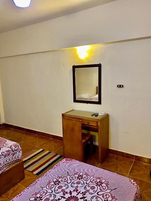 Postel nebo postele na pokoji v ubytování Semiramis Hotel Royal Palace