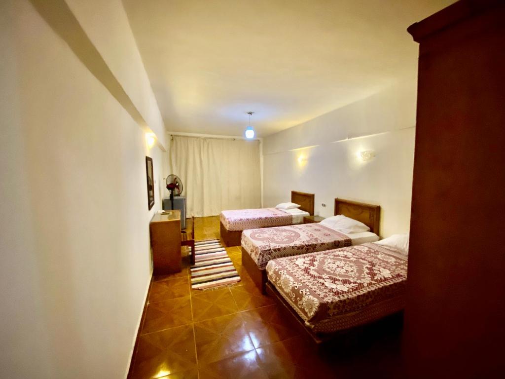 Postel nebo postele na pokoji v ubytování Semiramis Hotel Royal Palace