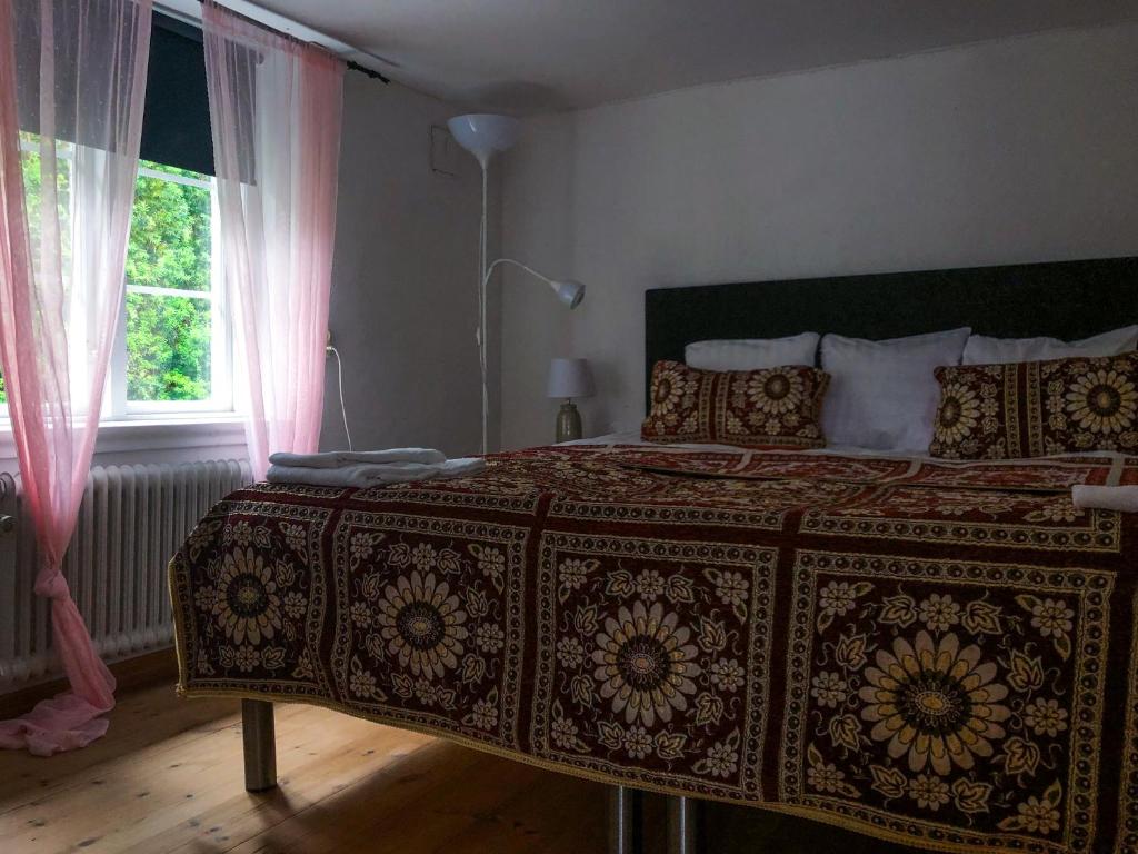 Postel nebo postele na pokoji v ubytování Stora Herrestad B&B