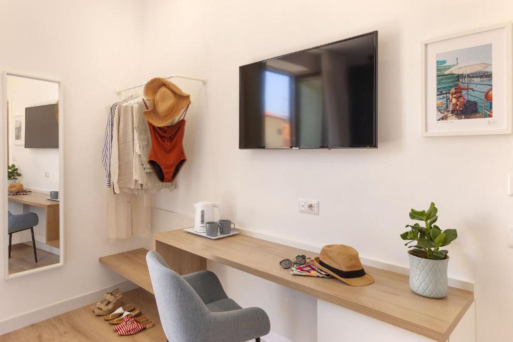 TV a/nebo společenská místnost v ubytování Corso 38 Sorrento