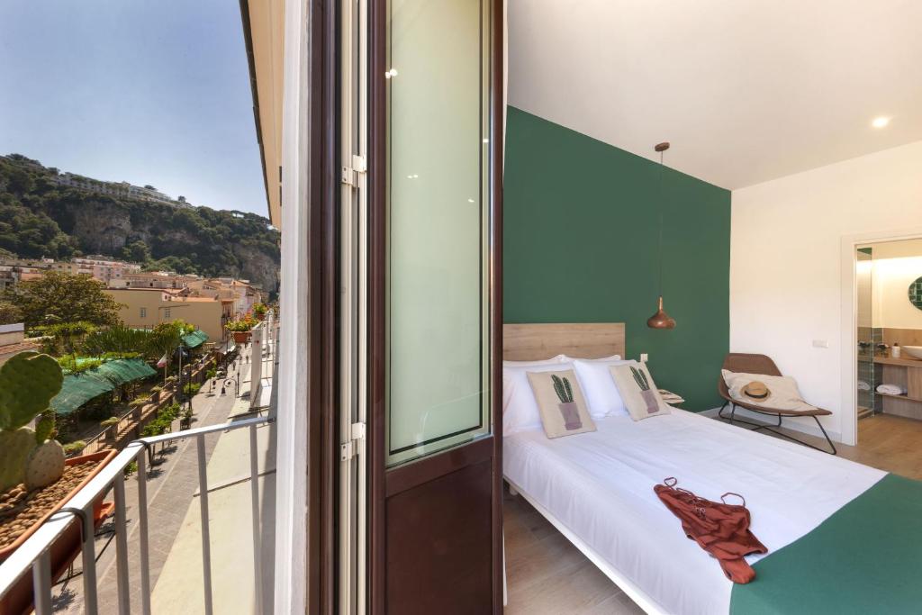 Postel nebo postele na pokoji v ubytování Corso 38 Sorrento