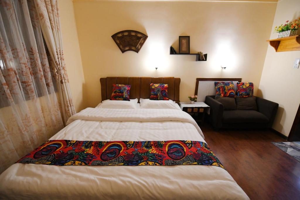 Postel nebo postele na pokoji v ubytování Maple Leaf Inn