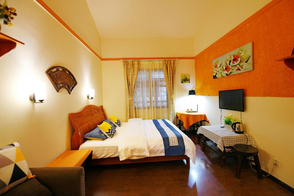 Postel nebo postele na pokoji v ubytování Maple Leaf Inn