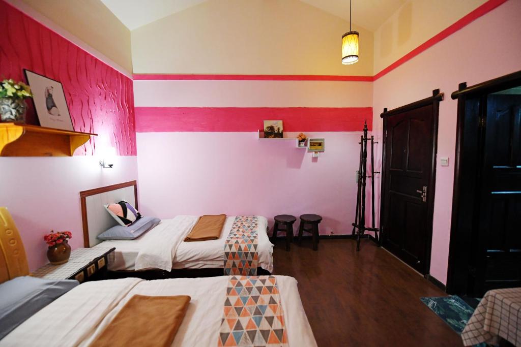 Postel nebo postele na pokoji v ubytování Maple Leaf Inn