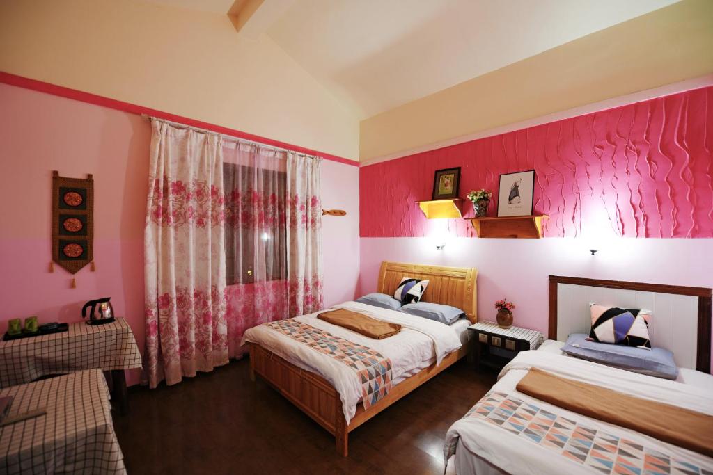Postel nebo postele na pokoji v ubytování Maple Leaf Inn