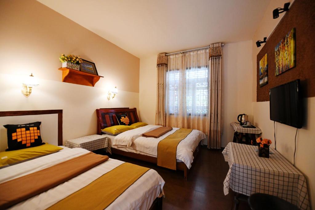 Postel nebo postele na pokoji v ubytování Maple Leaf Inn