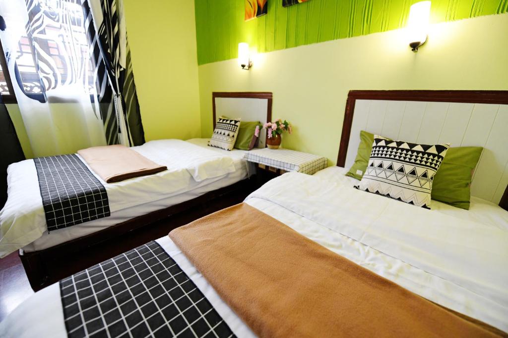 Postel nebo postele na pokoji v ubytování Maple Leaf Inn