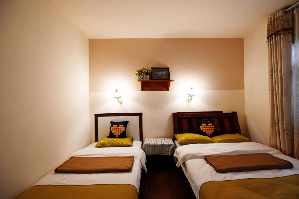 Postel nebo postele na pokoji v ubytování Maple Leaf Inn